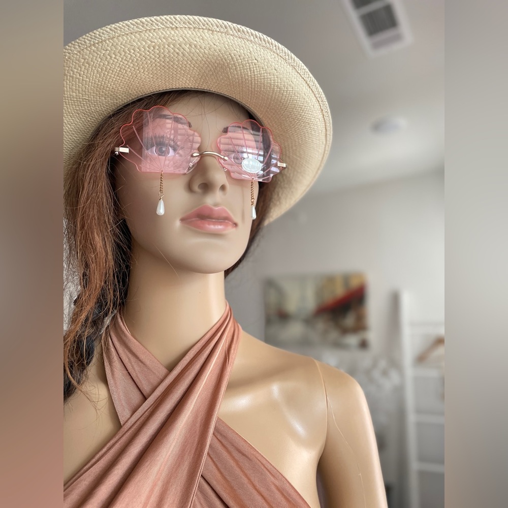 Pink Sea Shell Shaped Sunglasses With Pearl Drop Accent.
